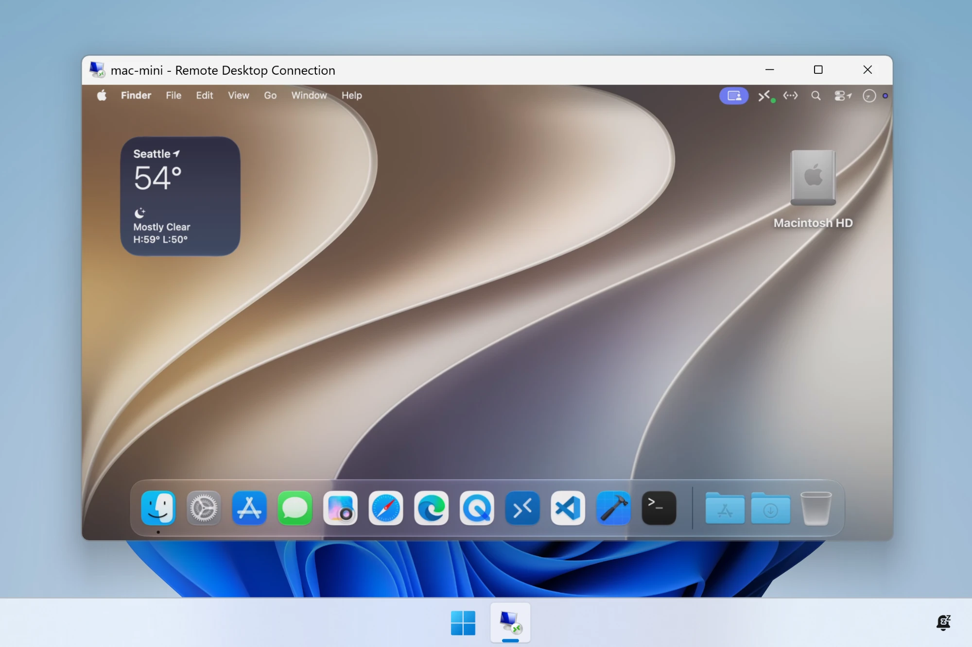 A Remote Desktop Connection window on Windows 11 titled mac-mini, showing the macOS desktop with the Finder menu bar, a weather widget, and the Dock.
